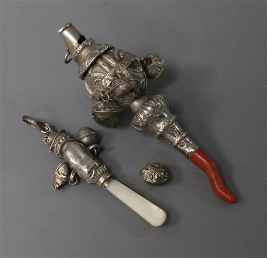 A Victorian silver childs rattle by George Unite and a later silver rattle.